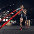 Young-healthy-man-athlete-doing-exercise-with-ropes-gym-single-male-model-practicing-hard-training-his-upper-body-concept-healthy-lifestyle-sport-fitness-bodybuilding-wellbeing_155003-27879